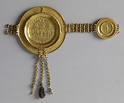 Section of a belt containing two gold medallions, the larger coin depicting the triumphant emperor in his chariot;[63] The Walters Art Museum