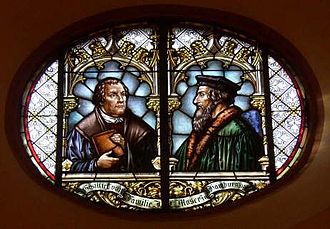 Glass window in the town church of Wiesloch featuring Martin Luther and John Calvin commemorating the 1821 union of Lutheran and Reformed churches in the Grand Duchy of Baden
