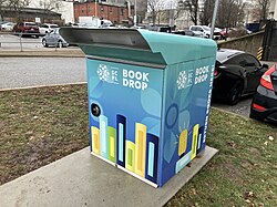 An outdoor book drop box.