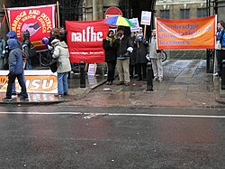 Banners of AUT, NATFHE, Cambridge TUC, and Cambridge University Students' Union.