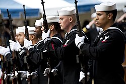 Members of the Honor Guard prepare for the 21 Gun Salute during a Pearl Harbor Remembrance Ceremony at Joint Expeditionary Base Little Creek-Fort Story, 7 December 2012