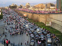 Anti-Syrian protesters heading to Martyrs' Square in Beirut on foot and in vehicles, 13 March 2005