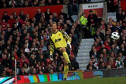 Edwin van der Sar, pictured playing for Manchester United during the 2010–11 season, is considered to be one of the pioneers of the sweeper-keeper role.