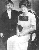 Beiderbecke, age 8, poses with a neighbor, Nora Lasher, in 1911.[13][14]