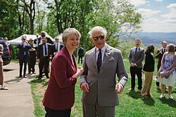 Cooper with Charles III at Shenandoah National Park during the 2026 state visit.