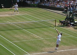 Nadal serves to Federer during the 2006 Wimbledon final.