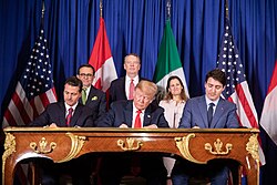 Mexican President Enrique Peña Nieto, U.S. President Donald Trump, and Canadian Prime Minister Justin Trudeau sign the U.S.–Mexico–Canada Agreement during the 2018 G20 Buenos Aires summit