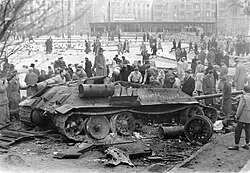 A destroyed Soviet tank in Budapest during the Revolution of 1956. Time's Man of the Year for 1956 was the Hungarian freedom fighter.[117]