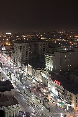 Canal Street at night, looking away from the river towards Mid-City; the traditional dividing line.