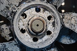 Rear of the torpedo, with a clamshell fragment inside one of screw hub holes[75]