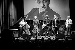 Django Reinhardt, "originator" of gypsy jazz, presides over the Hot Club de Norvège at Djangofestivalen 2018.