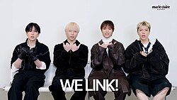 Fuma, Nicholas, EJ, and Maki delivering the group's "we link" introduction greeting in 2025