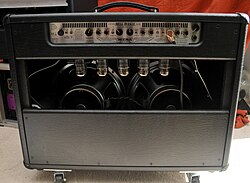 Back view of a Mesa/Boogie Lone Star combo partially showing its pair of 12" speakers.