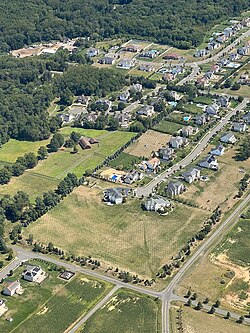 Aerial view in 2025 of Monroe Township, which has transitioned from a true exurb into a more suburban environment.