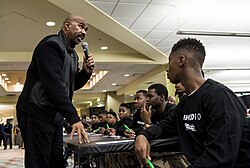 Harvey talking to a group of Chicago youths during the Steve Harvey Mentoring Weekend in 2015