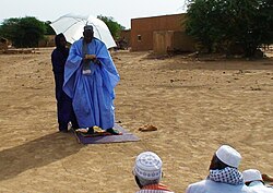 An imam in Senegal leading a prayer