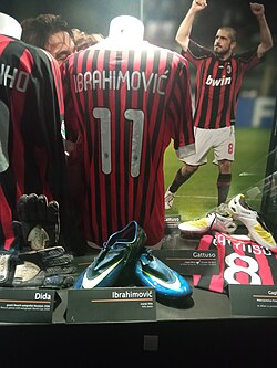 Ibrahimović‘s number 11 AC Milan jersey in the San Siro museum. He scored for both AC Milan and Inter Milan in the Derby della Madonnina.