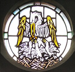 Depiction of a pelican with chicks on a stained glass window, Saint Mark's Church, Gillingham, Kent