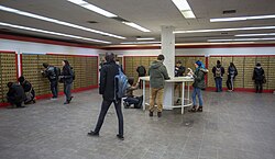 Students attend an unstaffed postal facility