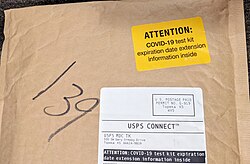 COVID-19 test kits distributed by the USPS, photographed in 2023