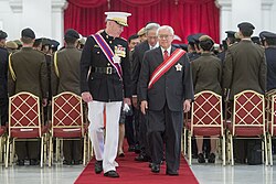 Tan (right) wearing his DUT sash in 2017