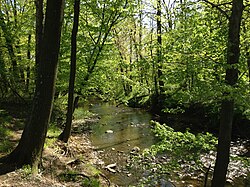 The Shabakunk Creek, below Colonial Lake, flowing in the southern portion of the township towards Trenton.