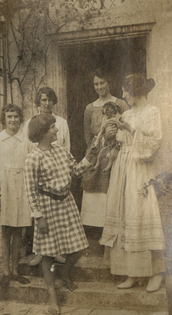 1918: Unknown girl on left, Dorothy Brett is behind Julian Vinogradoff in foreground. Dorothy Maud Wrinch in doorway and Lady Ottoline Morrell on the right