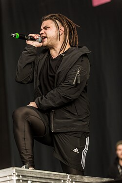 Biesler performing with the band in 2018