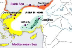 Distribution of varieties of Greek in Anatolia, 1910. Demotic in yellow. Pontic in orange. Cappadocian Greek in green, with green dots indicating individual Cappadocian Greek villages.[28]
