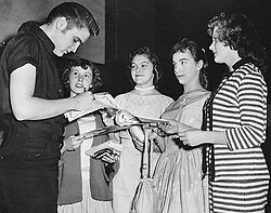 Presley signing autographs in Minneapolis in 1956