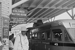 Sign for the "colored" waiting room at a bus station in Durham, North Carolina, 1940