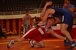 A takedown attempt during a freestyle match