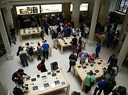 Apple's concept stores include video walls, Wi-Fi and desks to provide an immersive customer experience.