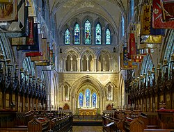 Choir of St Patrick's Cathedral, Dublin, with the banners of those who were Knights of St Patrick in 1871