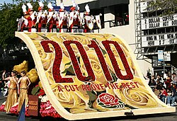 Theme float "2010: A Cut Above the Rest" rolling down Colorado Boulevard during the parade