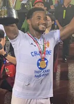 Rafaelson celebrating the 2023–24 V.League 1 title with Nam Định.