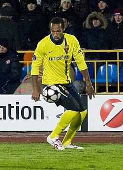 Henry playing for Barcelona in a UEFA Champions League game during the 2009–10 season