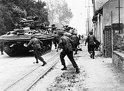 Men of 4 (Army) Commando engaged in house to house fighting with the Germans at Riva Bella, near Ouistreham