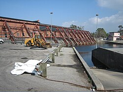 Metarie Pumping Station, also known as Pumping Station 6, was constructed in 1899, near Metarie Road and the head of the 17th Street Canal. Now housing 15 Wood Screw Pumps, it can move over 6 billion US gallons (23,000,000 m3) of water a day.