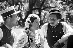 Two men and a woman in folk costumes from the Lublin region, 1938