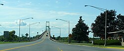 Two-lane stretch of I-81 on the Thousand Islands Bridge crossing part of the Saint Lawrence River