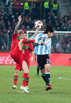 Banega and Raul Meireles of Portugal in a 2011 friendly
