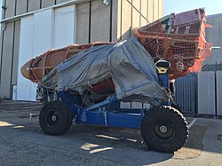 X-38 V-201 orbital test vehicle as currently displayed atop its ground mobility carrier at NASA-Johnson Space Center behind Building 49.