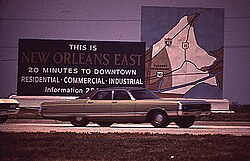 Billboard promoting the eastern New Orleans "New Town" development, 1972. Note the darker-toned 'Current Development' portion, encompassing present-day Village de L'Est and Oak Island, as well as Venetian Isles and a sliver of Irish Bayou. The light-toned portion is mostly today's Bayou Sauvage National Wildlife Refuge