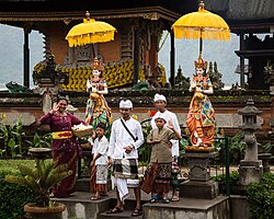 Balinese family after performing puja in a temple