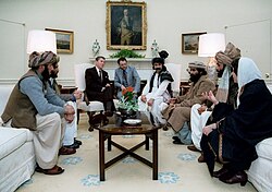 President Reagan publicizes his support by meeting with Afghan mujahideen leaders in the White House, 1983