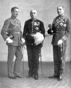 Geoffrey (pictured left) with his father and brother John