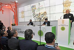 Narendra Modi addressing the inauguration of the India Pavilion, at COP21, in the presence of his ministers Prakash Javadekar and Piyush Goyal