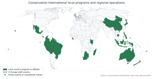 World map showing Conservation International local programs and regional operations. Local country programs or affiliates are shaded in green, CI-Europe staff countries are shaded in blue-gray, and Hawaiʻi is marked with a point.