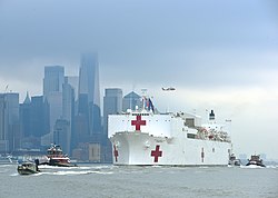 The hospital ship USNS Comfort arrives in Manhattan on 30 March 2020.